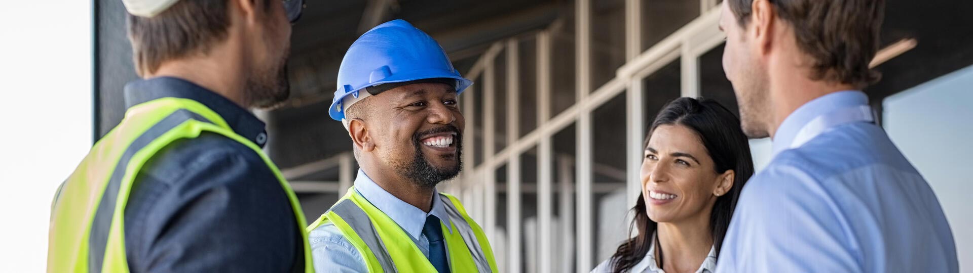 Black man Home builder, developer meeting with other consultants